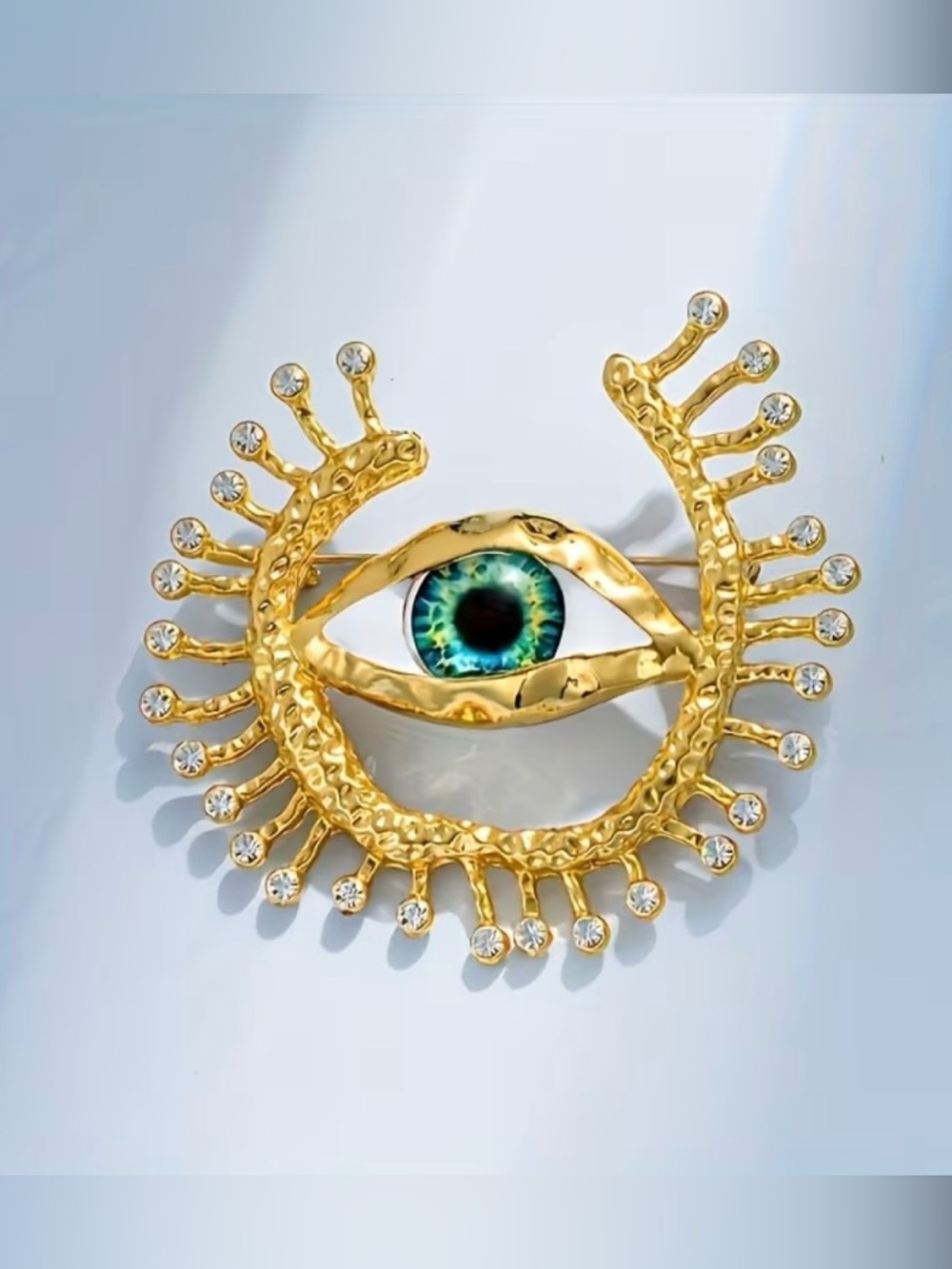 Schiaparelli Inspired Gold-Tone Evil Eye Brooch with Green Center